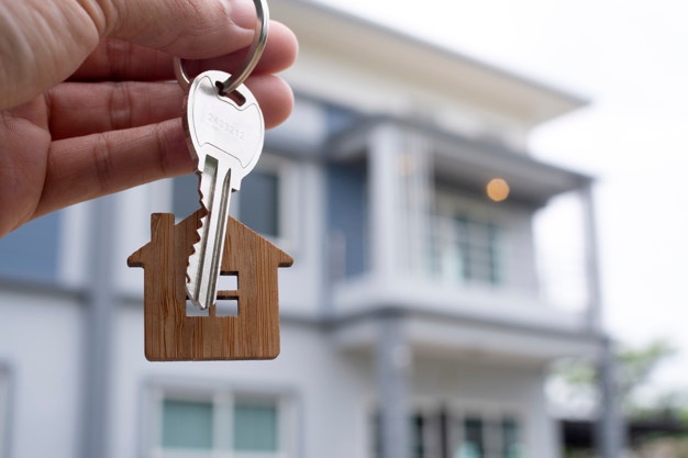 landlord-unlocks-house-key-new-home-real-estate-agents-sales-agents_112699-358.jpg